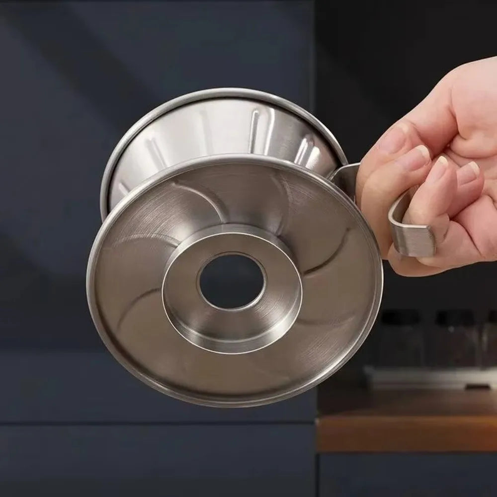 Ribbed stainless steel pour-over coffee dripper ensuring optimal extraction for delicious home brew.