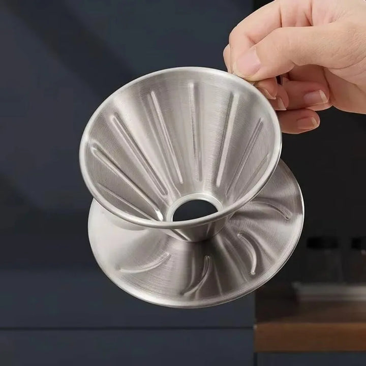 Premium stainless steel pour-over coffee dripper; a reusable and durable kitchen tool for daily brewing.