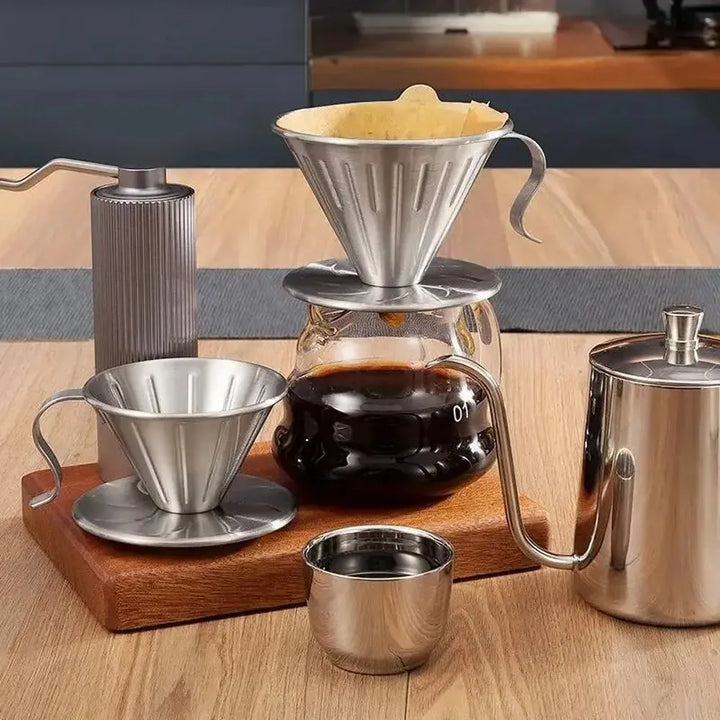 Sleek stainless steel ribbed pour-over coffee dripper, a durable home coffee maker for perfect brewing.