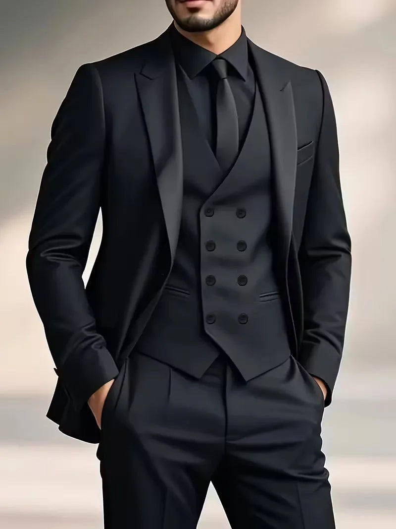 Men's slim fit three-piece formal suit. Elegant tailored blazer, double-breasted waistcoat & trousers for events.