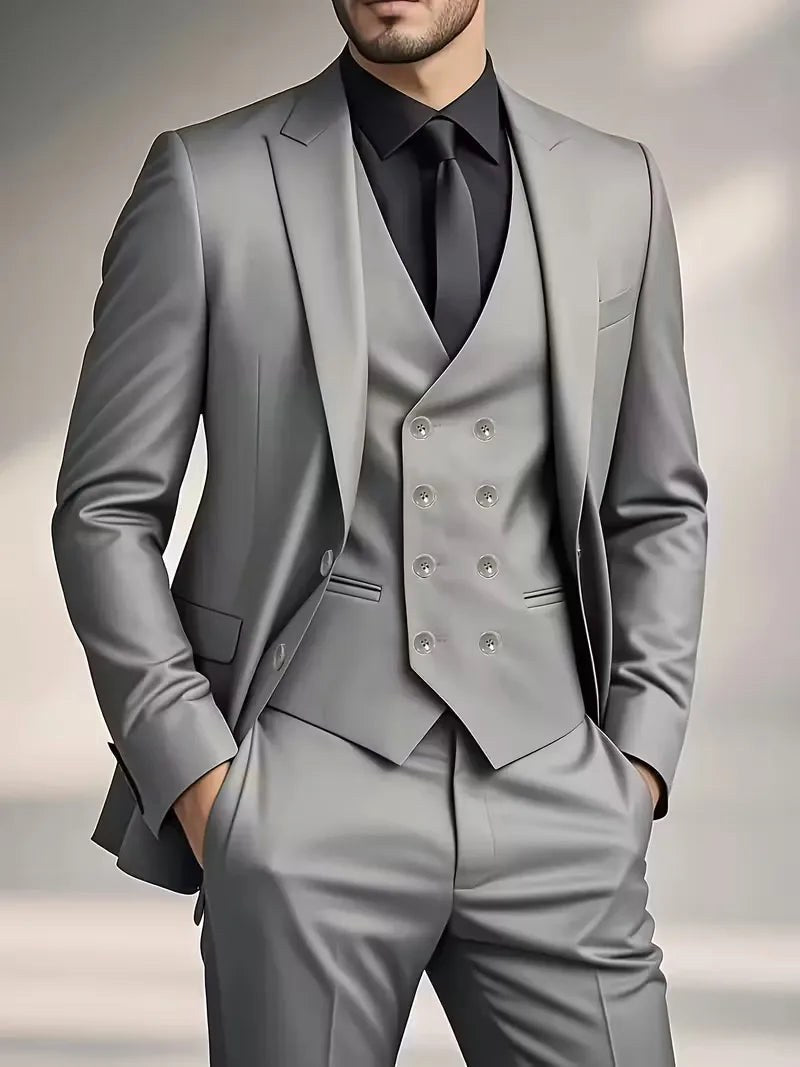 Full-length shot of a men's slim fit three-piece formal suit. Tailored for weddings and business.