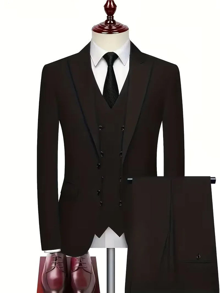 Stylish men's slim fit formal wedding suit. Three-piece set with tailored blazer, waistcoat & trousers.