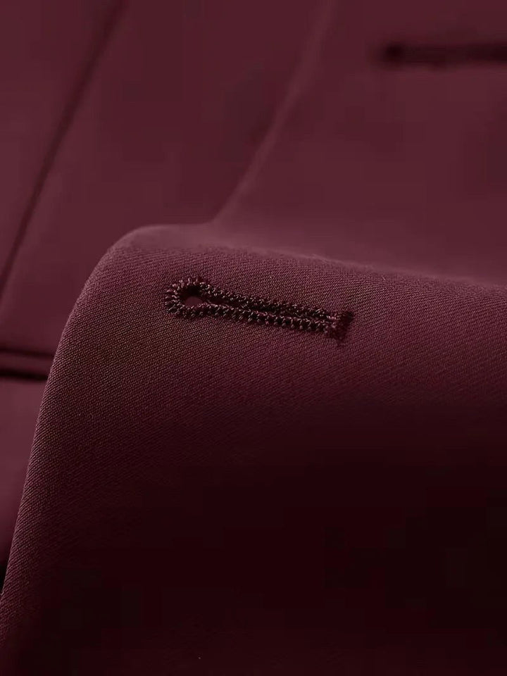 High-fashion men's slim fit three-piece formal suit. Tailored for ultimate elegance & special events.