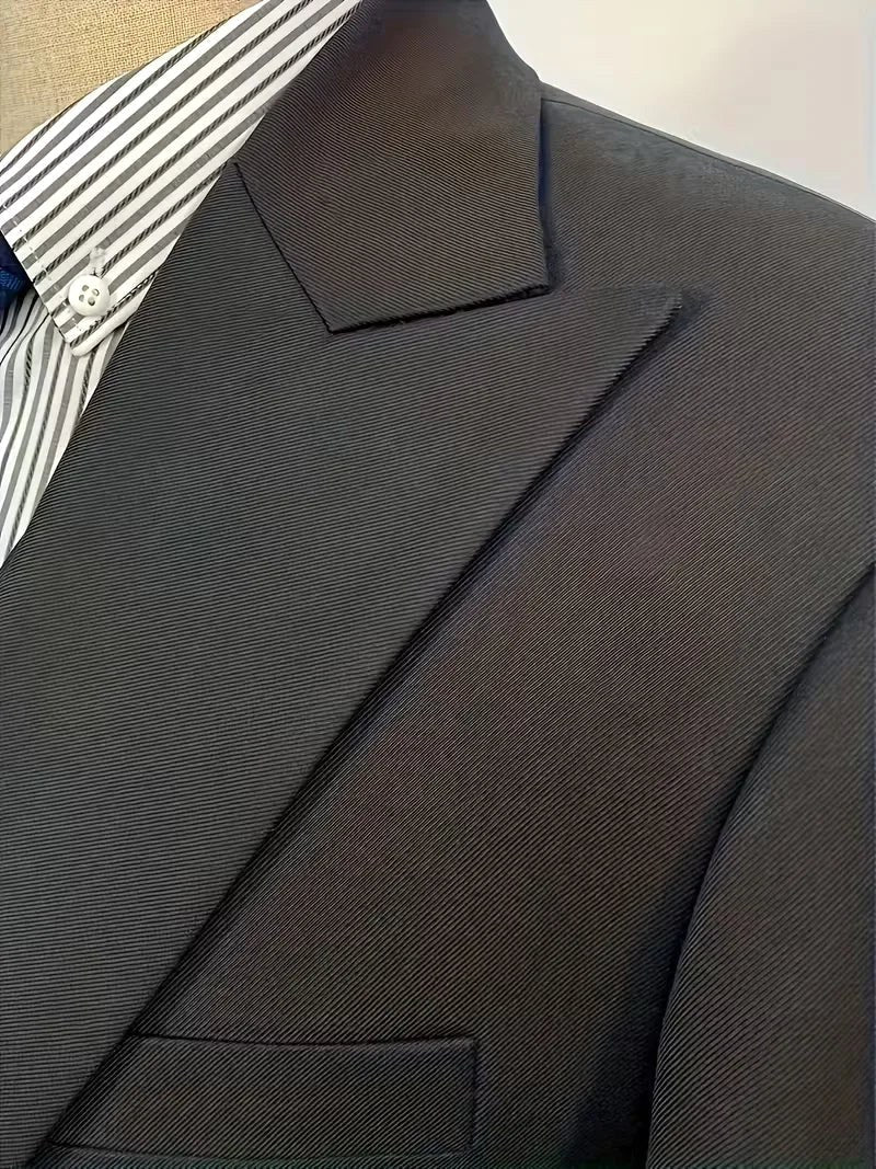 Elegant men's three-piece formal wear. Slim fit tailored suit with a double-breasted waistcoat.