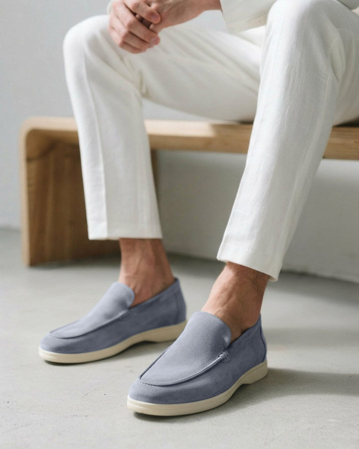 Grey men's slip-on loafers, a comfortable & versatile smart casual shoe for modern style.