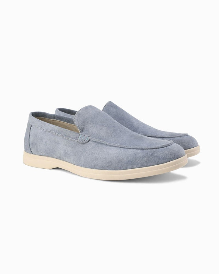 Rich brown men's slip-on loafers, ideal footwear for a comfortable smart casual appearance.