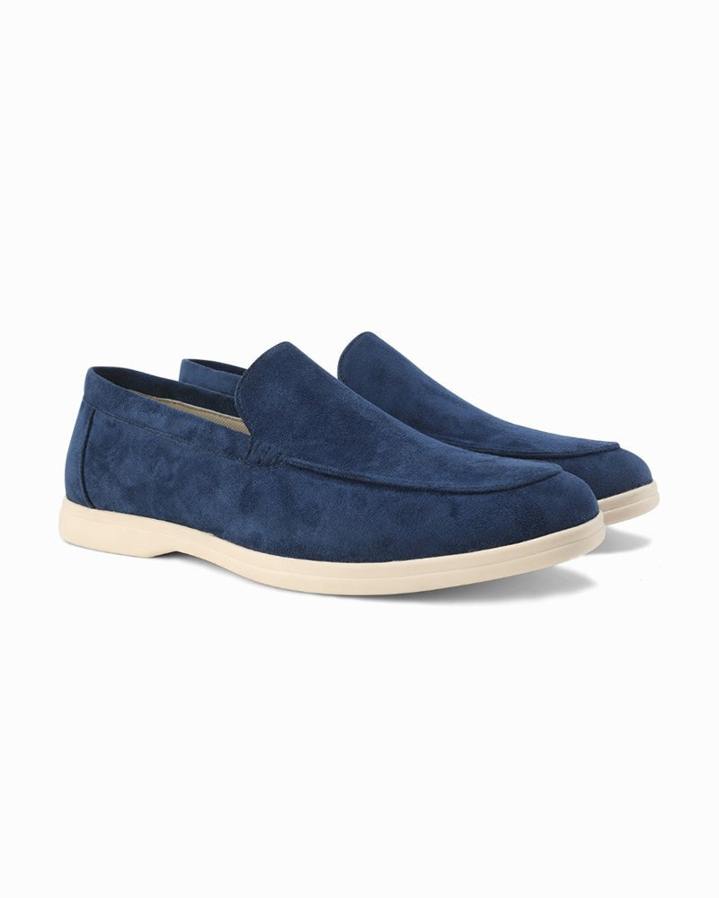 Pair of versatile beige men's slip-on loafers, perfect for effortless smart casual style.