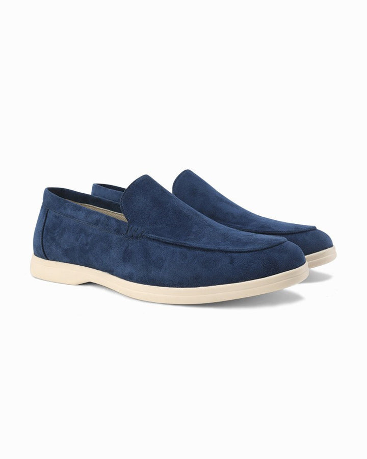 Pair of versatile beige men's slip-on loafers, perfect for effortless smart casual style.