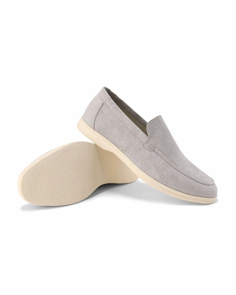 Comfortable blue men's slip-on loafers, perfect for weekend casual wear and relaxed style.
