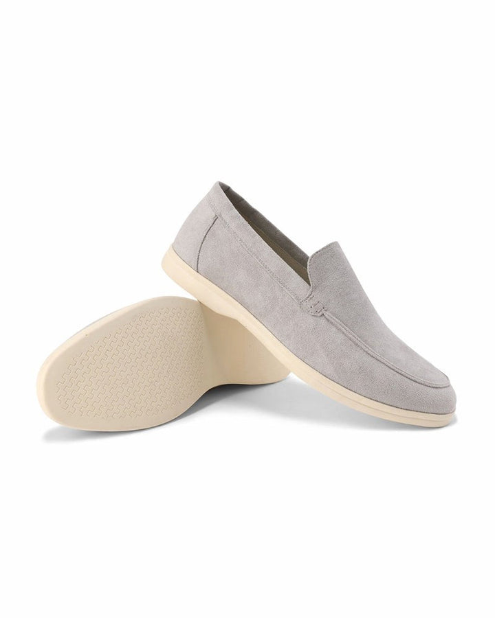 Comfortable blue men's slip-on loafers, perfect for weekend casual wear and relaxed style.