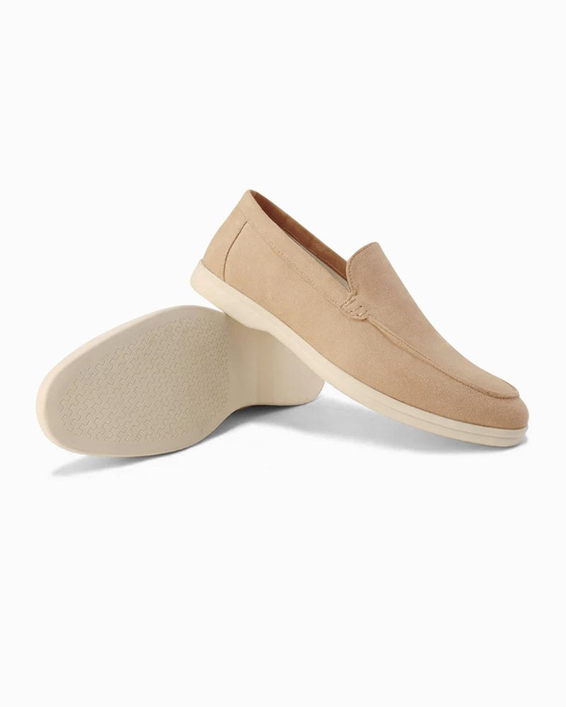 Blue men's comfortable slip-on loafers, capturing the shoe's sleek design for everyday wear.
