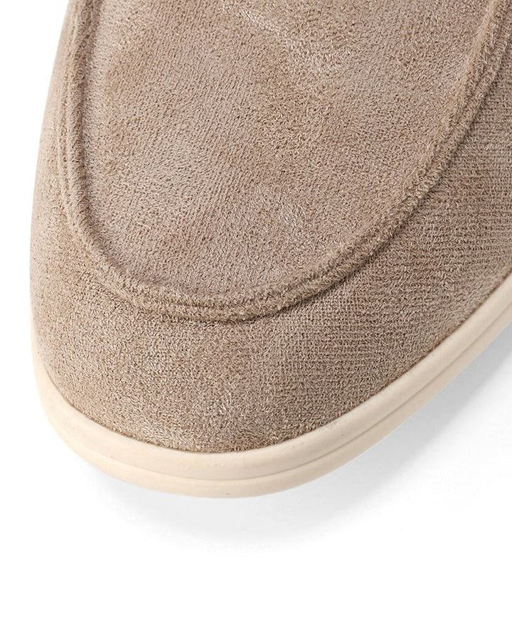Versatile black men's slip-on loafers, ideal footwear for effortless smart casual style.