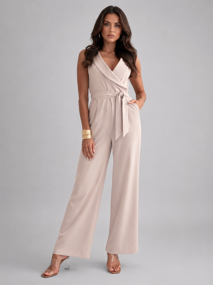 Elegant women's sleeveless wrap front wide leg jumpsuit with tie waist, perfect for versatile summer outfits.