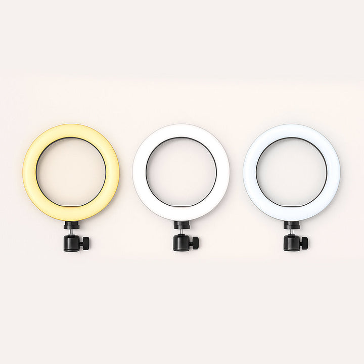 Versatile photography ring light with adjustable stand, providing soft, even lighting for portraits & vlogs.