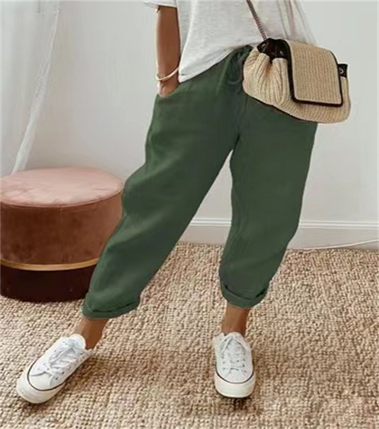 Women's comfortable flowy pants, featuring a wide-leg design & adjustable waist for elegant, relaxed style.