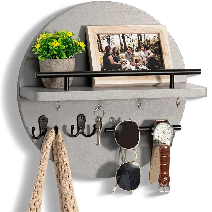 Elegant round wooden wall key organizer with a handy shelf, ideal for entryway key storage & small items.