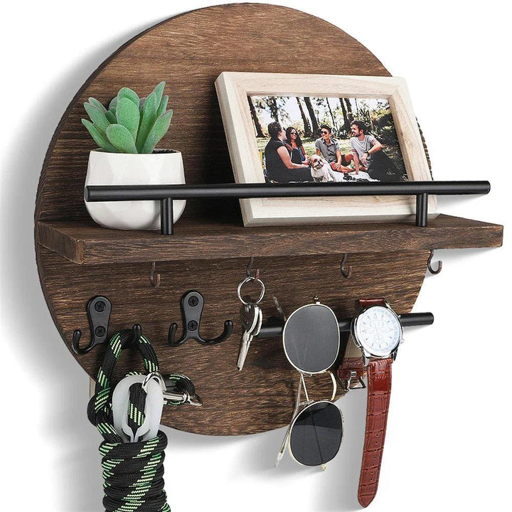 Minimalist round wooden key holder with built-in shelf, a sleek wall-mounted key rack for home decor.