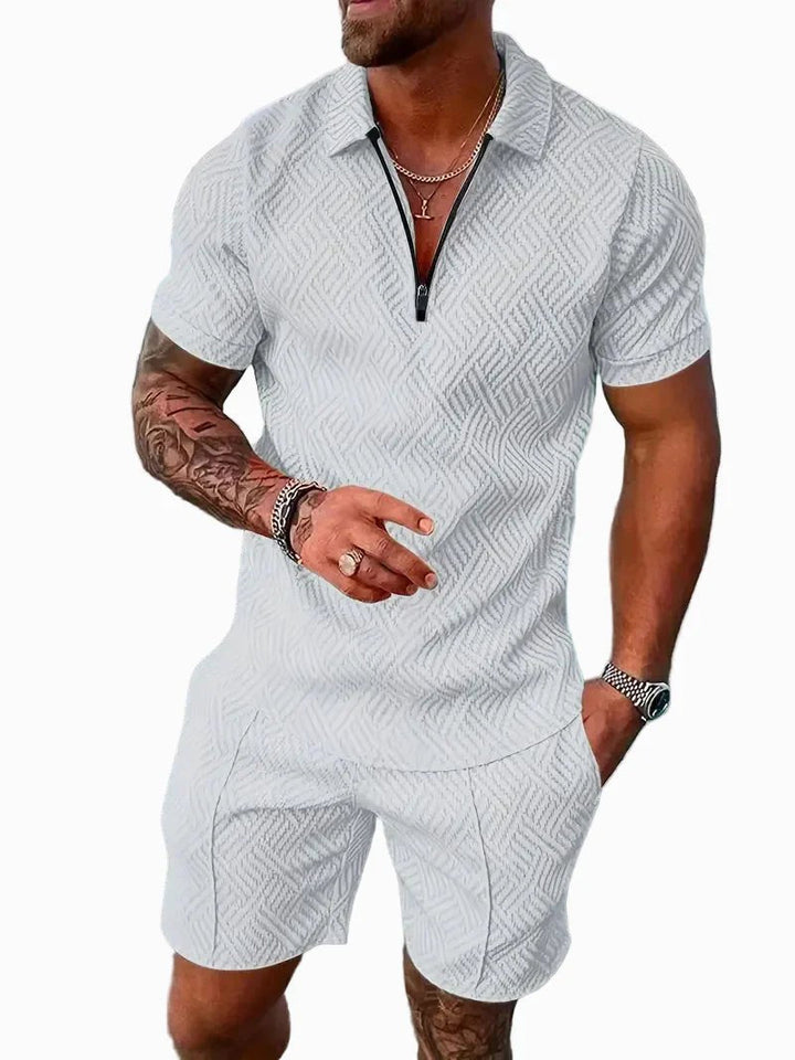 Comfortable men's two-piece polo shirt and shorts set. Ideal leisurewear for warm weather and casual style.