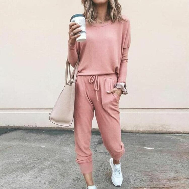 Women's cozy long sleeve lounge set in a relaxed fit, perfect for comfortable casual wear at home.