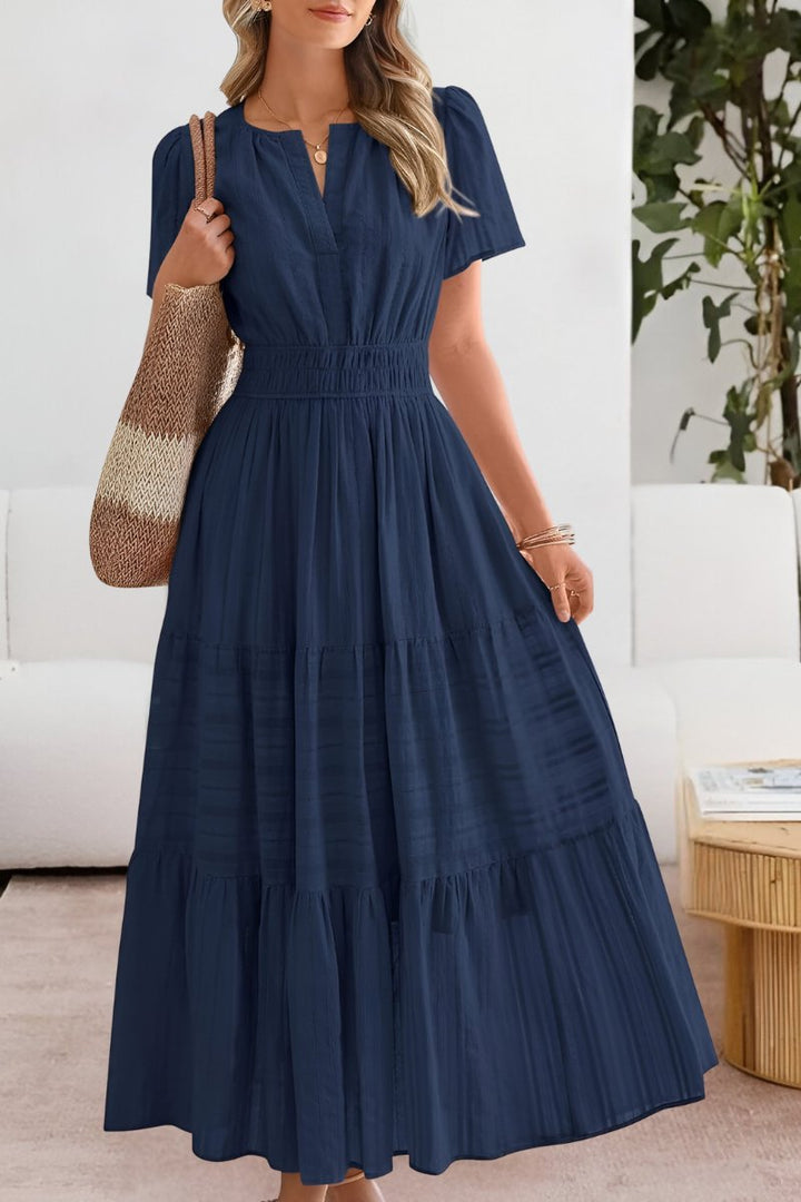 Boho-style women's tiered maxi dress, a perfect casual chic outfit for beachwear.