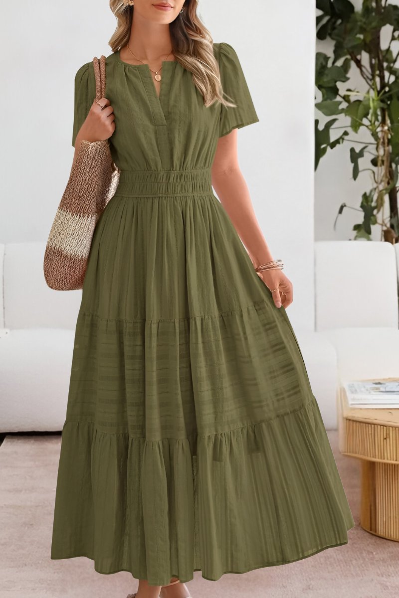 Casual women's tiered maxi dress with flutter sleeves, a versatile boho style summer outfit.