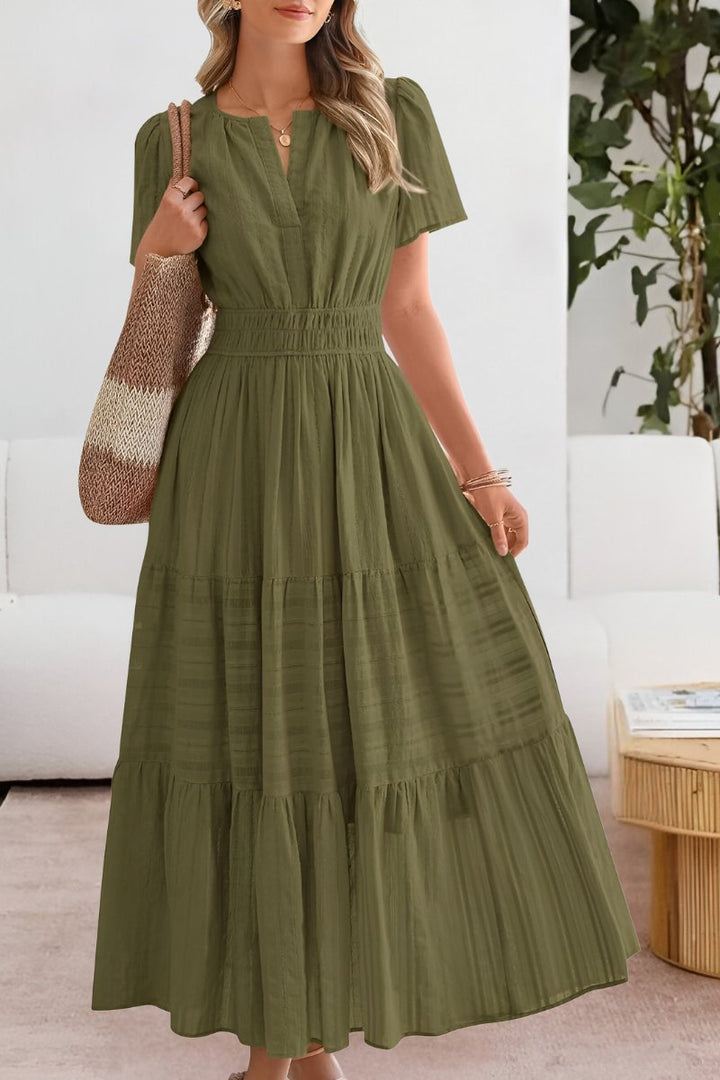 Casual women's tiered maxi dress with flutter sleeves, a versatile boho style summer outfit.