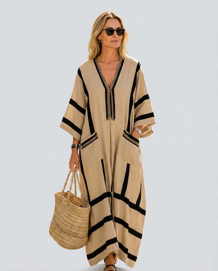 Comfortable women's striped V-neck kaftan dress, loose-fit maxi summer resort wear with pockets.
