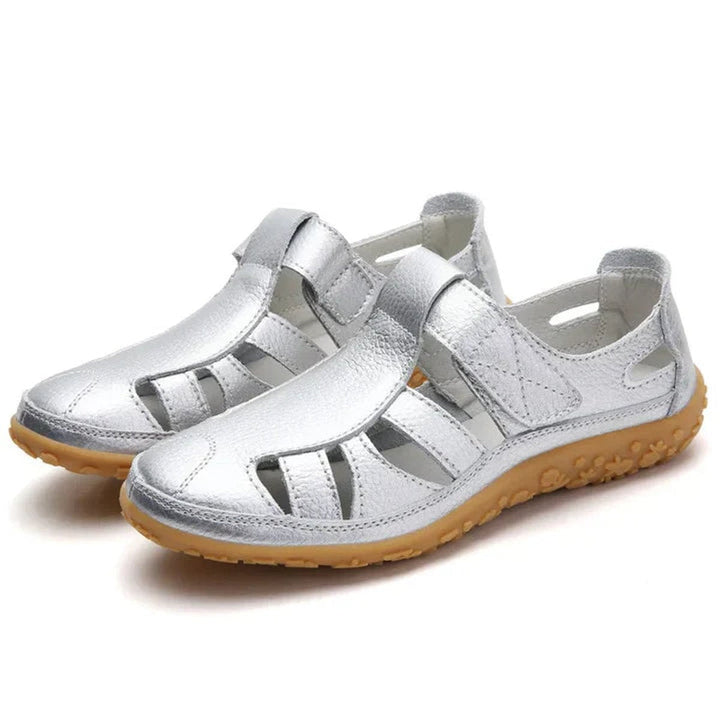 Comfortable women's closed-toe shoes with adjustable strap, ideal for foot health & arch support.