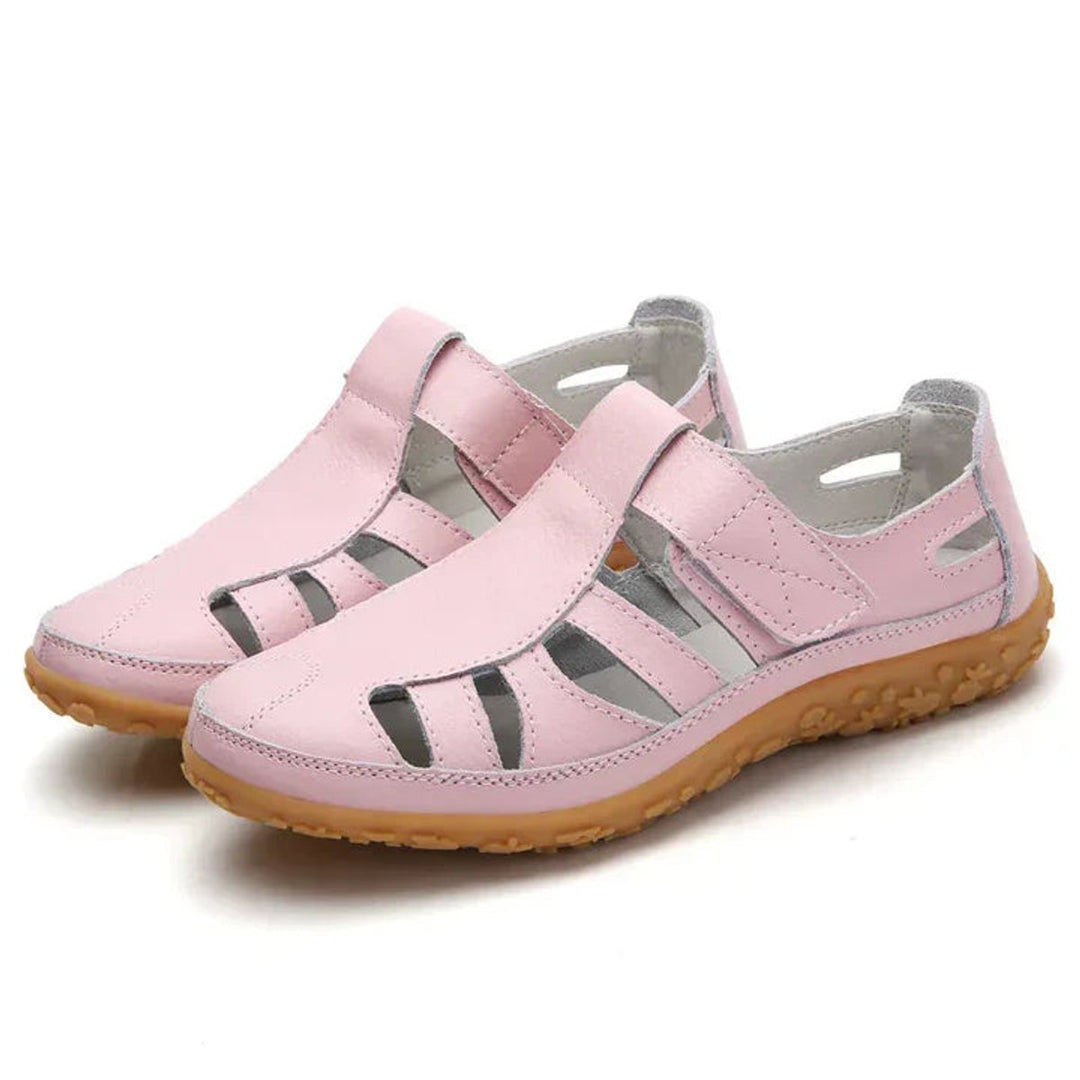 Front view of sophisticated closed-toe women's orthopedic shoes, highlighting arch support.
