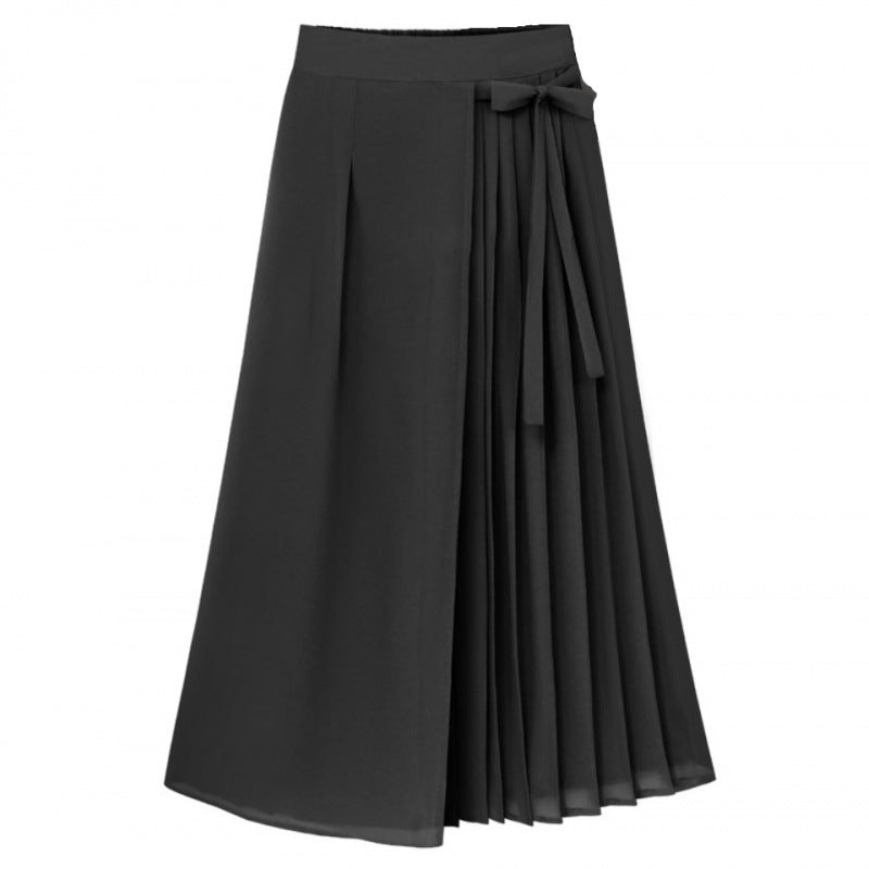 Close-up of a women's flattering A-line pleated midi skirt, showing the adjustable wrap-tie waist detail. Elegant and comfortable.