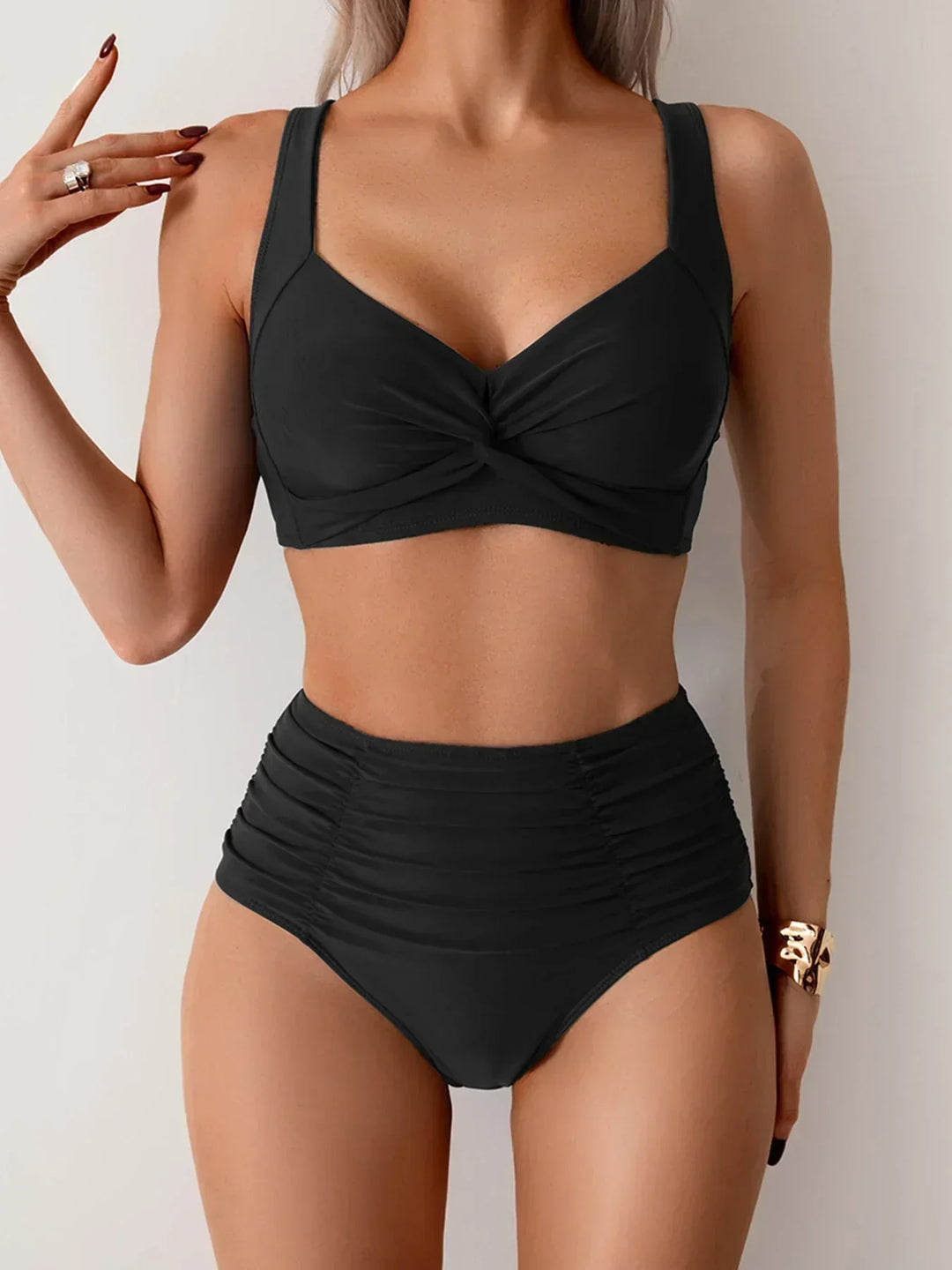 Women's high waisted twisted bikini set, ideal for summer swimwear & beach vacations.