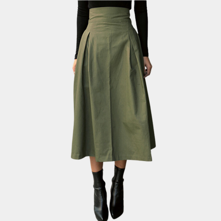 Women's high-waisted pleated A-line midi skirt in a versatile solid color, perfect for elegant office or casual wear.