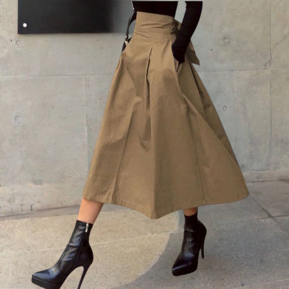 Elegant high-waisted pleated A-line midi skirt for women, ideal for sophisticated office attire or classy events.
