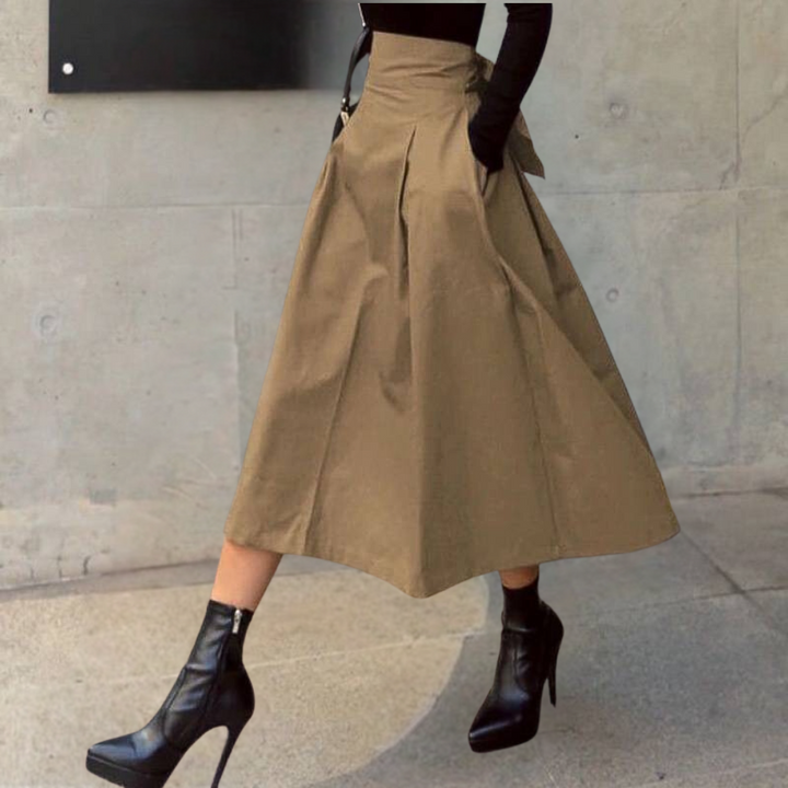 Elegant high-waisted pleated A-line midi skirt for women, ideal for sophisticated office attire or classy events.