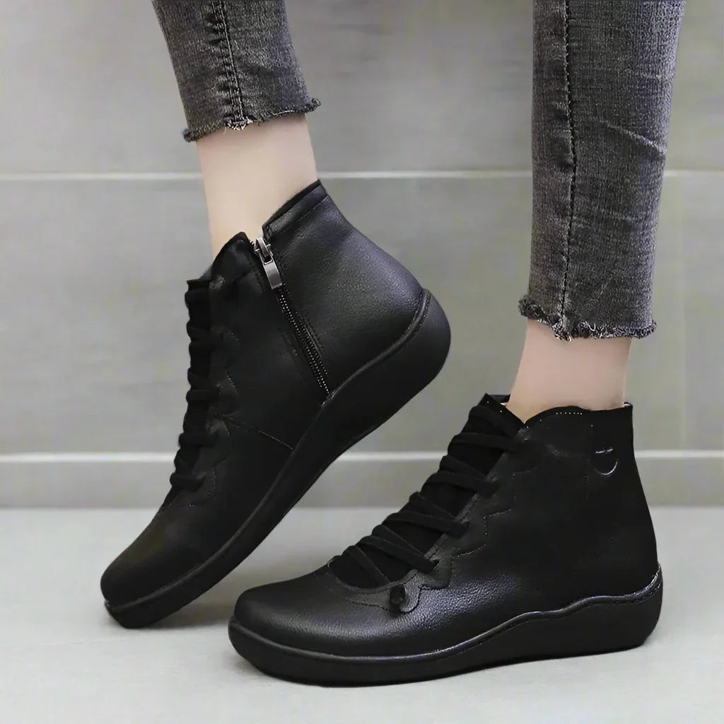 Women's easy-zip ankle boots for bunion relief. Wide toe box comfort, perfect for casual autumn wear.