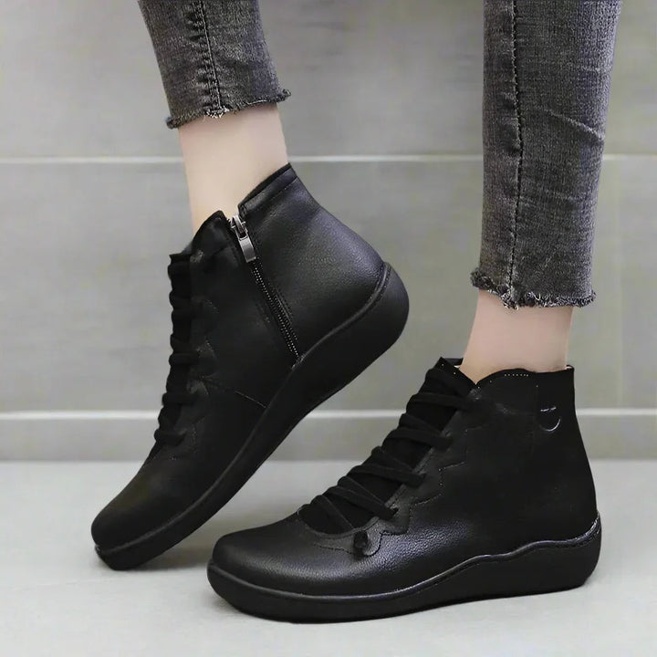 Women's easy-zip ankle boots for bunion relief. Wide toe box comfort, perfect for casual autumn wear.
