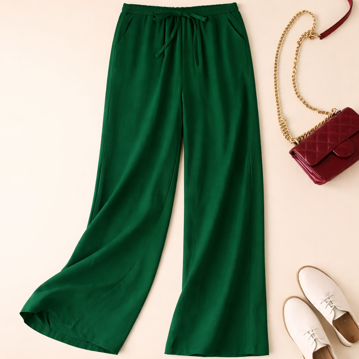 Soft fabric wide leg women's pants with drawstring waist, ideal for spring/summer comfort and versatile loungewear.