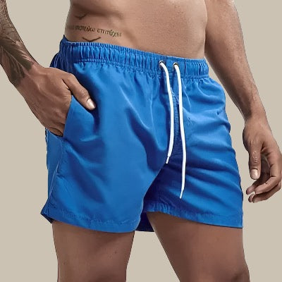 Performance men's quick-dry swim shorts. Ideal active wear for swimming, beach & pool days.