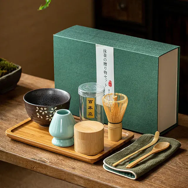 Japanese Matcha Chawan (tea bowl) with a bamboo whisk and scoop, essential for a tea ceremony.