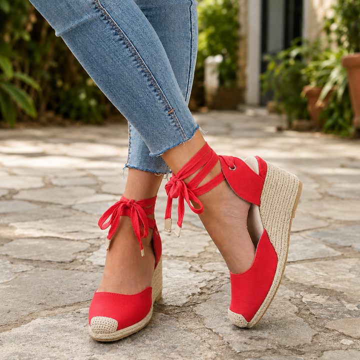 Stylish women's summer espadrille wedges, lace-up ankle straps enhance this elegant holiday footwear.