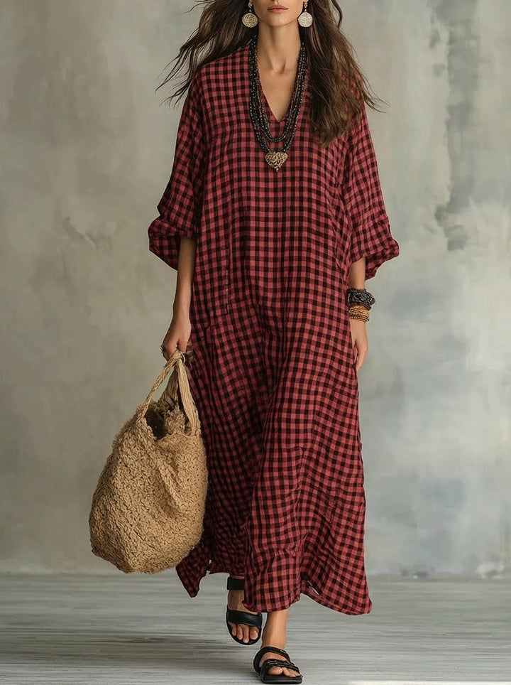 Soft, flowy women's oversized gingham maxi dress. V-neck & long sleeve design, perfect for a relaxed and stylish summer.