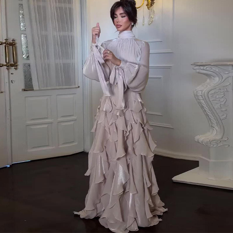Pink women's timeless high-neck ruffled maxi dress. Elegant formal wear, perfect as a wedding guest or party dress.