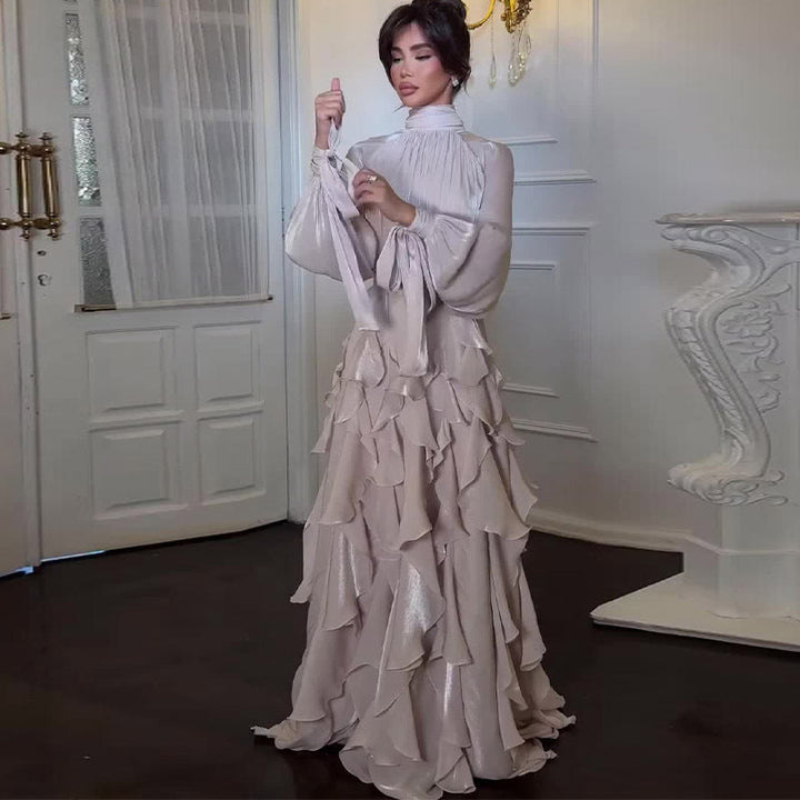 Pink women's timeless high-neck ruffled maxi dress. Elegant formal wear, perfect as a wedding guest or party dress.