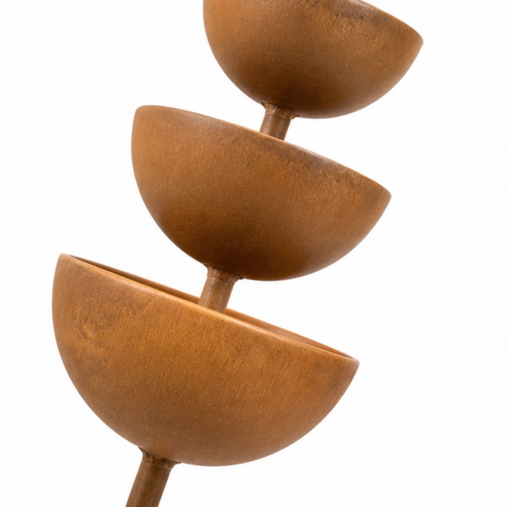 Tall rustic copper garden bird bath stake, creating a serene backyard sanctuary.