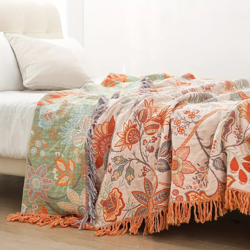 Soft boho floral cotton throw blanket for living room decor. Perfect cozy accent for bohemian and rustic homes.