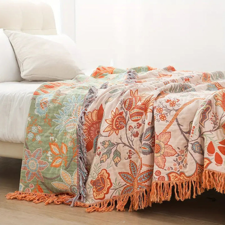 Soft boho floral cotton throw blanket for living room decor. Perfect cozy accent for bohemian and rustic homes.