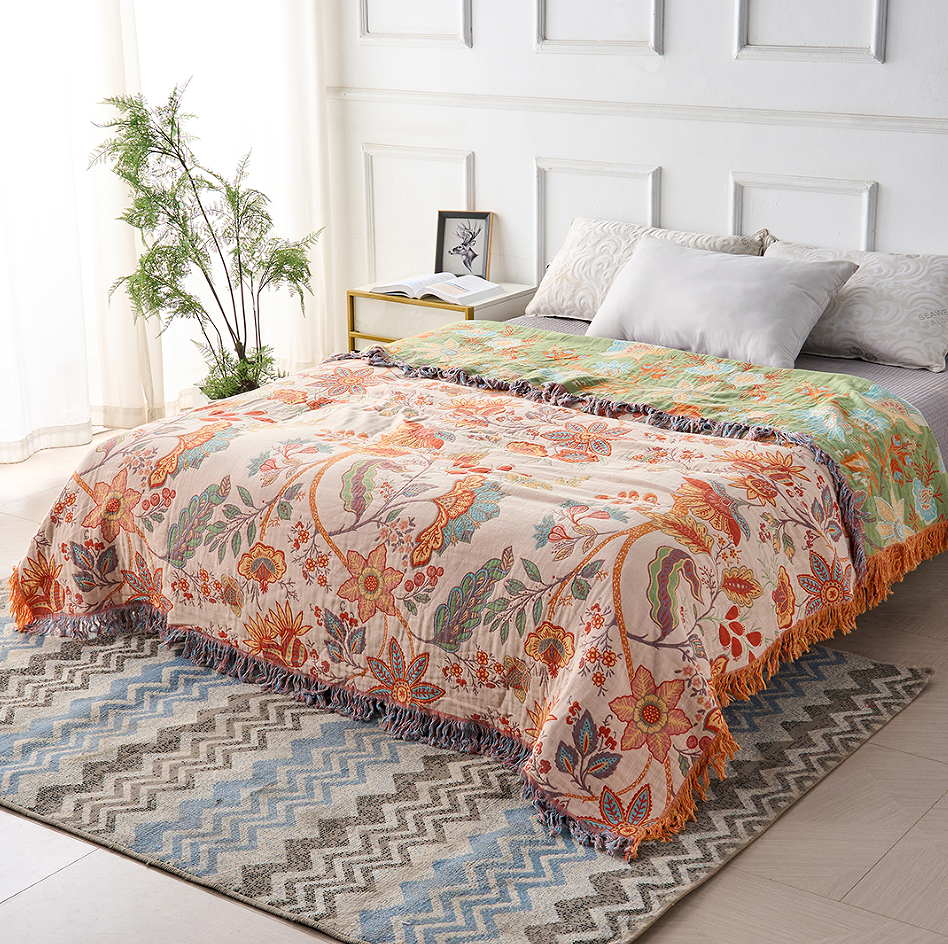 Rustic floral cotton throw blanket. Ideal cozy gift for bohemian decor lovers, a soft home accent for any room.