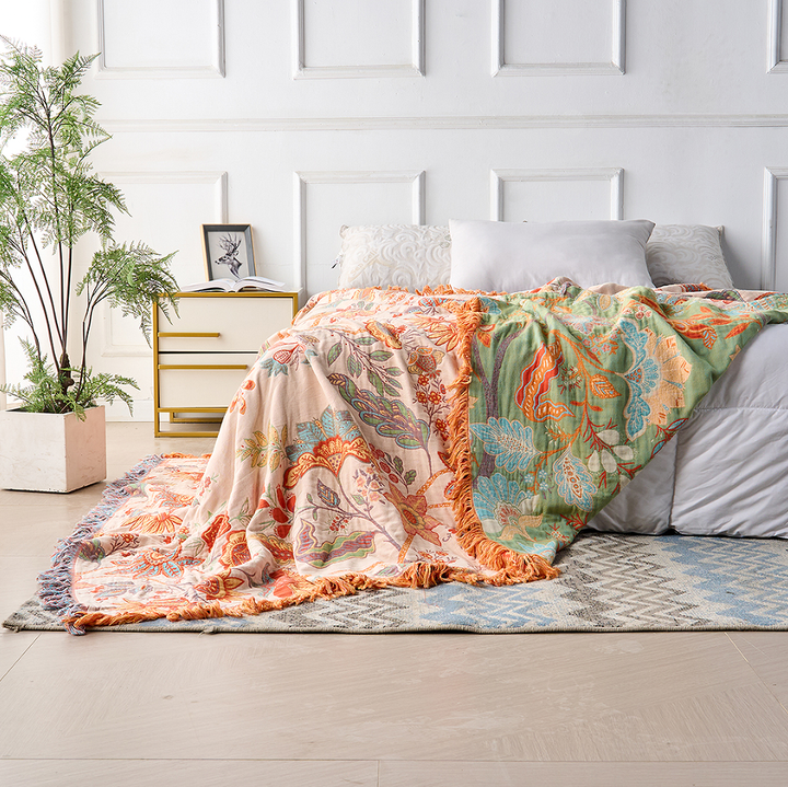 Large, cozy floral cotton throw blanket with boho print, perfect for living room decor & soft home accent.