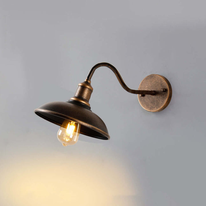Elegant rustic outdoor wall lamp, vintage brass style exterior light, enhances patio ambiance.