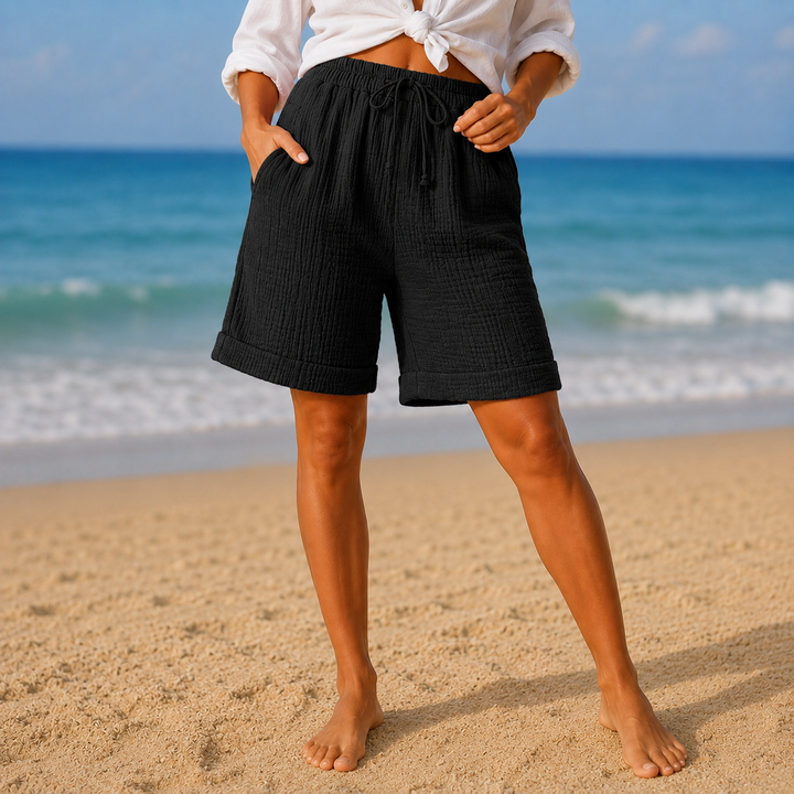 Easy-wear women's crinkle Bermuda shorts, offering comfort and style for summer leisure.